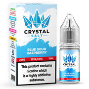A product image showing a bottle of Crystal Salt Blue Sour Raspberry e-liquid next to its packaging box. The packaging has a colorful design with a graphic of raspberries and a cigarette, indicating the flavor and nicotine content of the product.